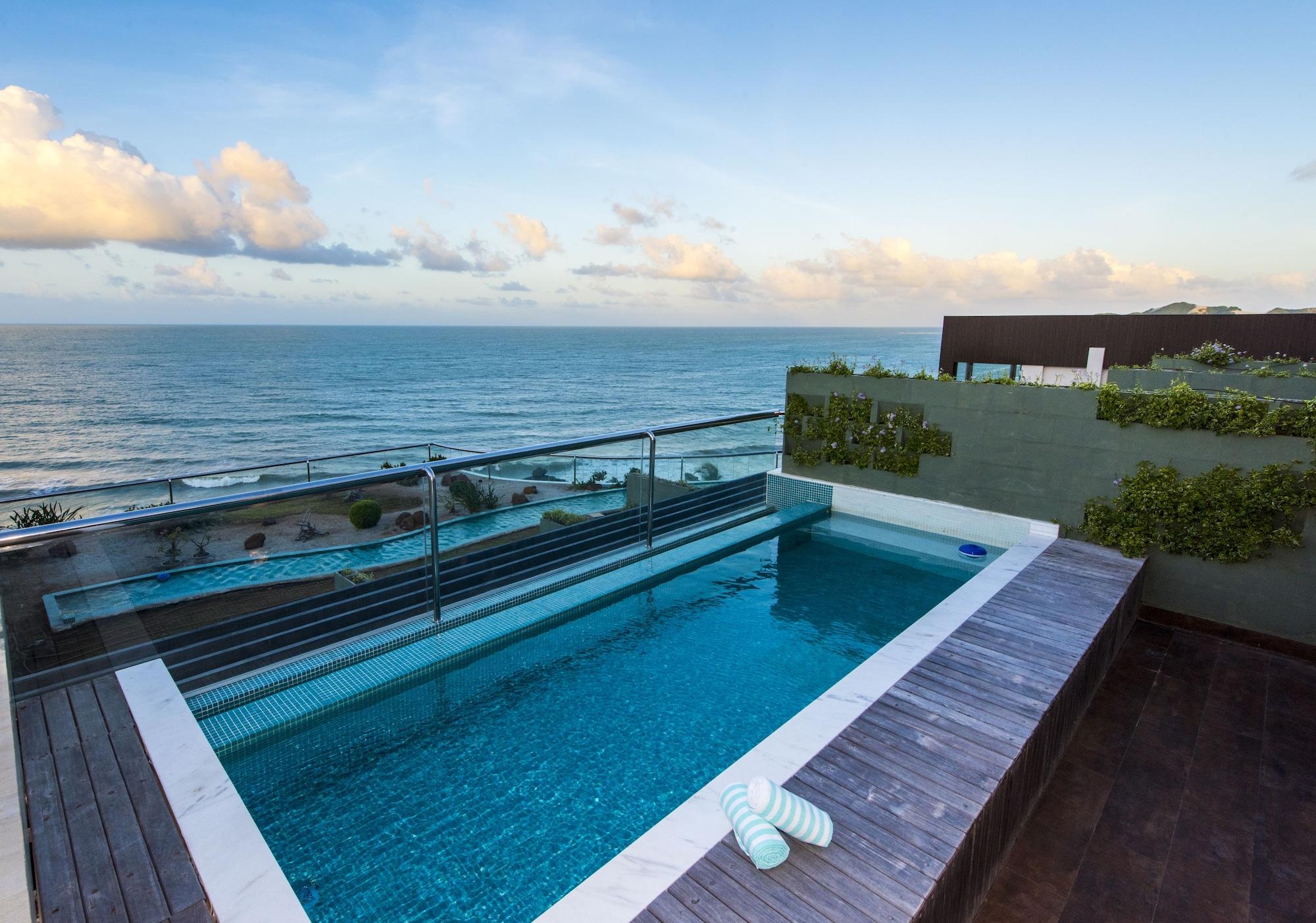 Vogal Luxury Beach Hotel & Spa Natal Exterior foto Rooftop pool at the hotel