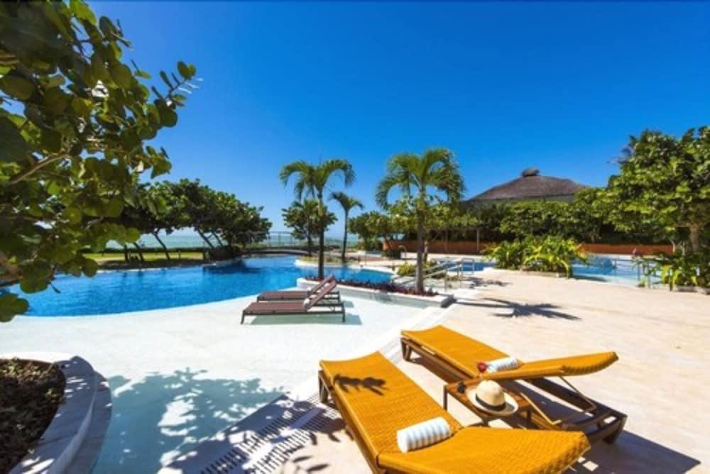 Vogal Luxury Beach Hotel & Spa Natal Exterior foto The beach at the resort