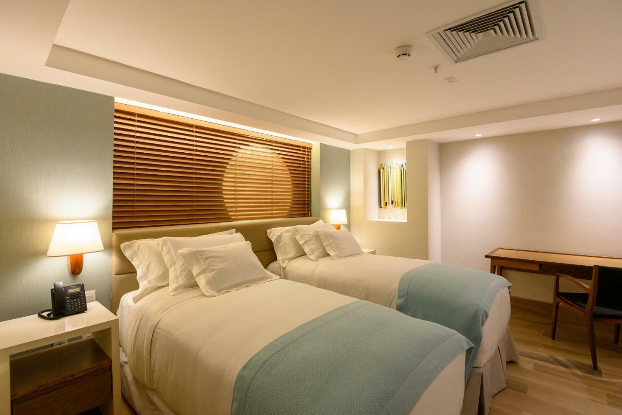 Vogal Luxury Beach Hotel & Spa Natal Exterior foto A room at the hotel