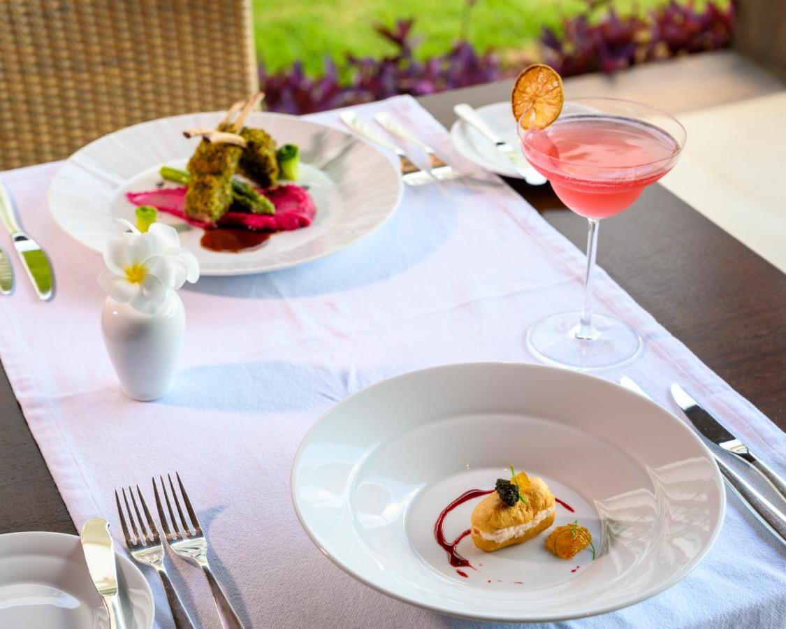 Vogal Luxury Beach Hotel & Spa Natal Exterior foto A meal at the restaurant